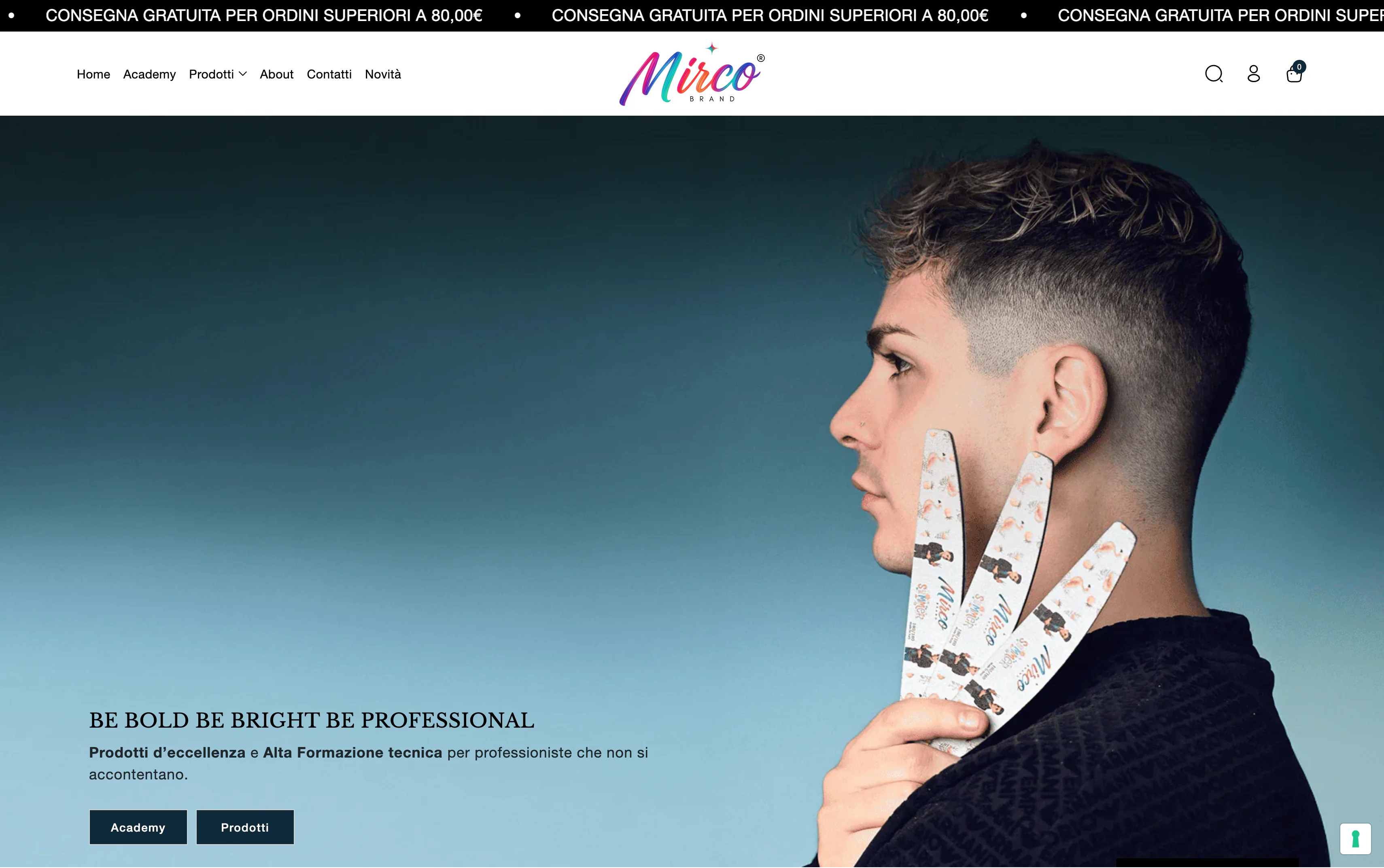 Homepage desktop di mircobrand.it: barra superiore con la promozione sulle spedizioni, menu di navigazione tra Academy e Prodotti, e slide di apertura con il claim «Be bold be bright be professional».